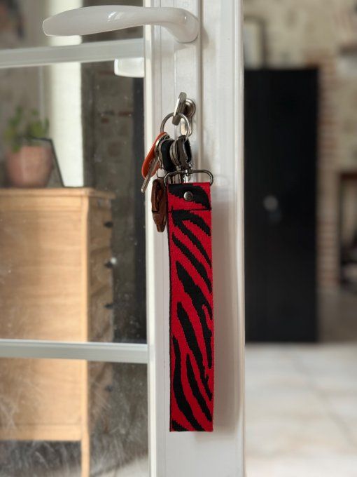 Le porte-clés léopard noir- beige